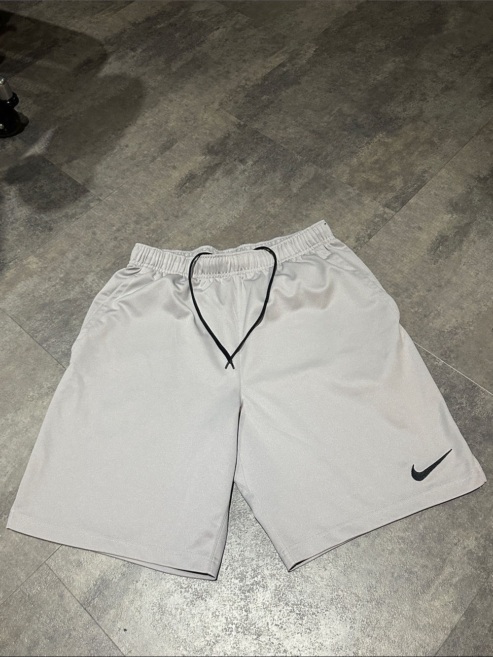 Nike Men’s Light Gray Athletic Shorts with Black Drawstring